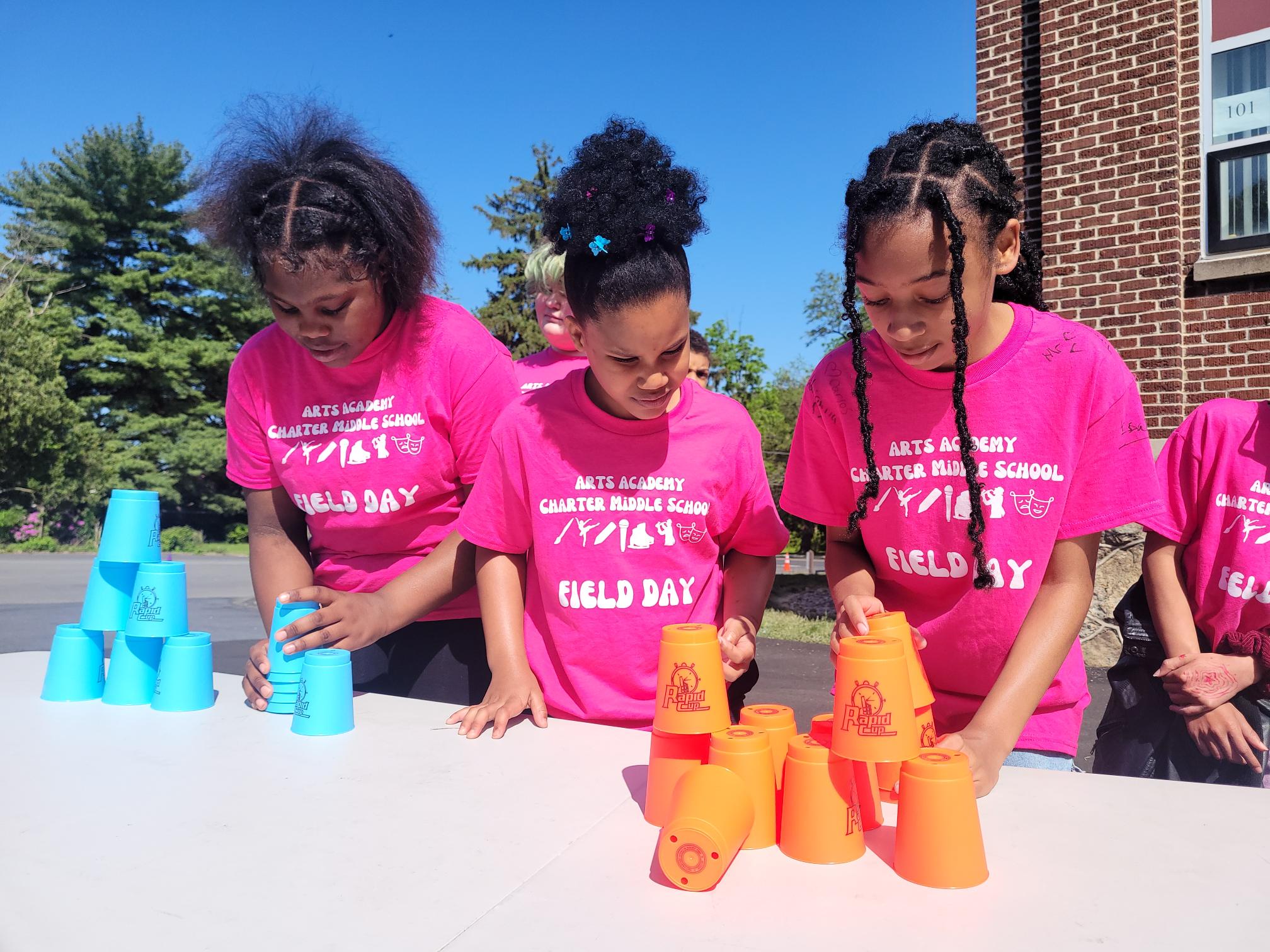 students competing in stacking cups