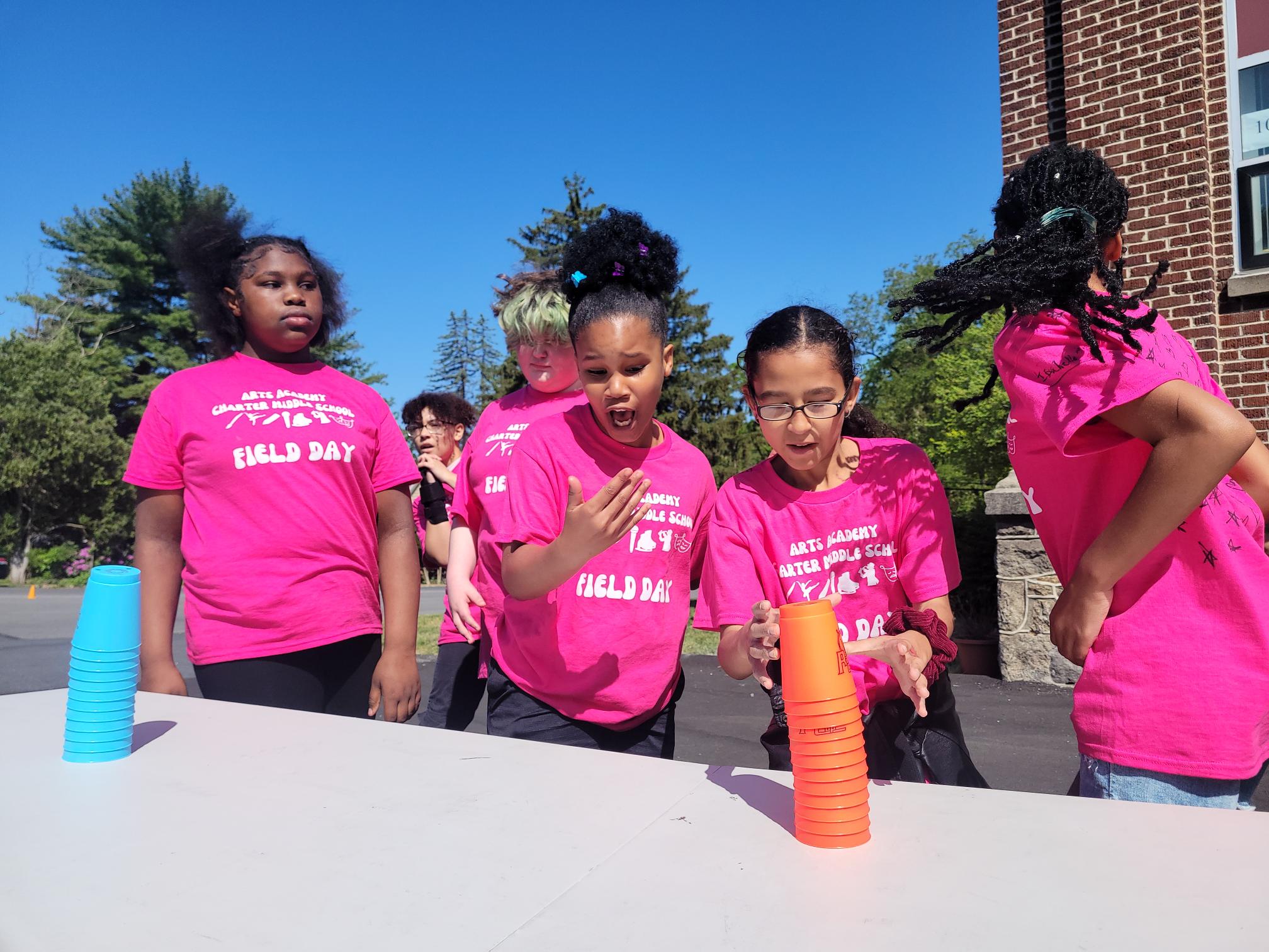 students competing in stacking cups